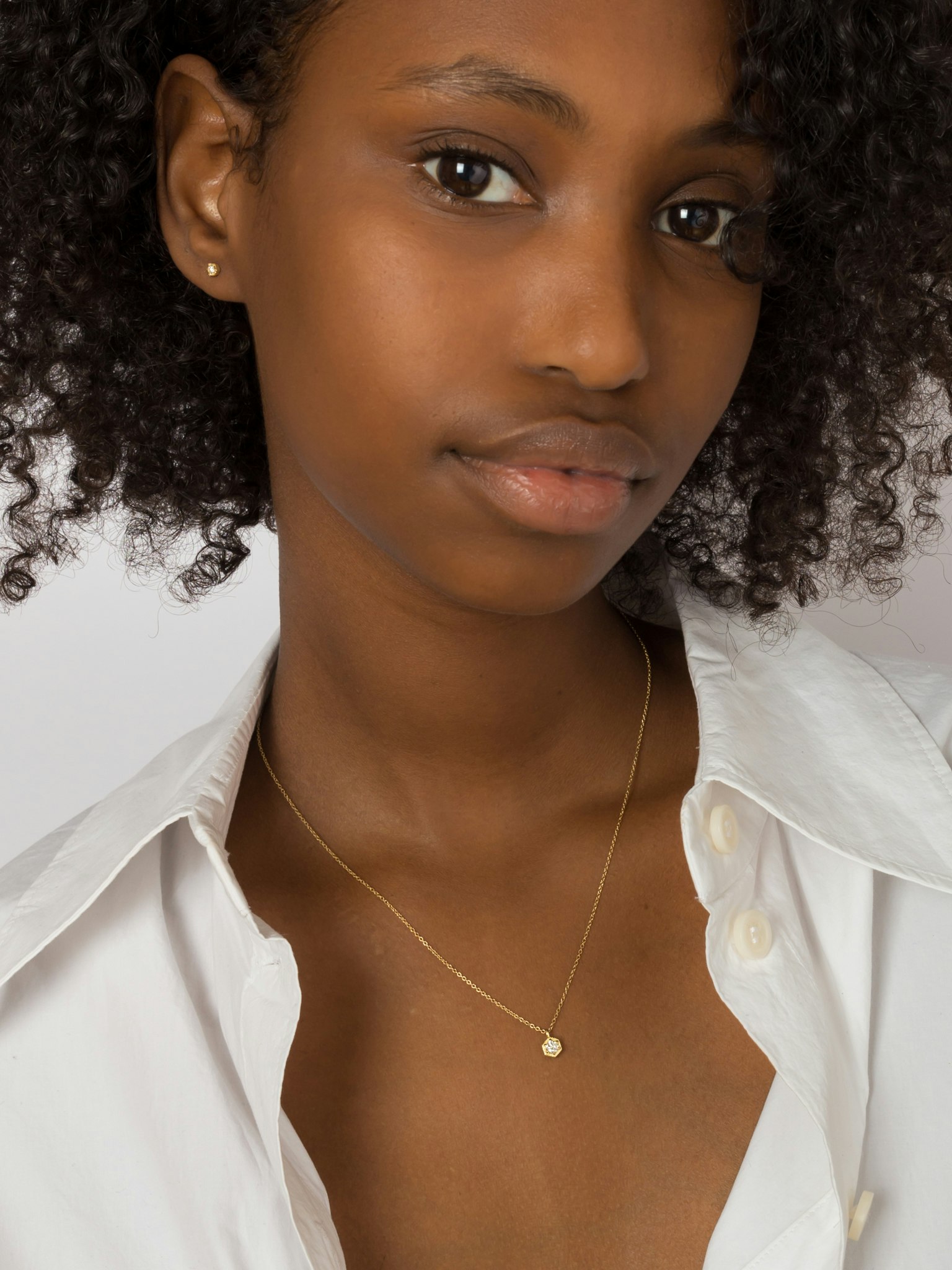 Baby white diamond hexagon studs photo 4