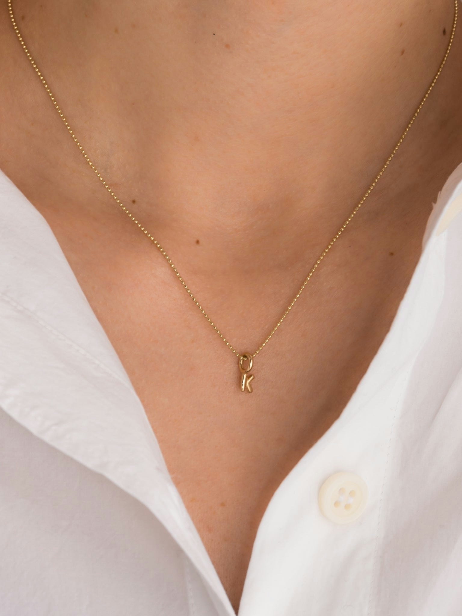 Mini helium initial charm necklace photo 2
