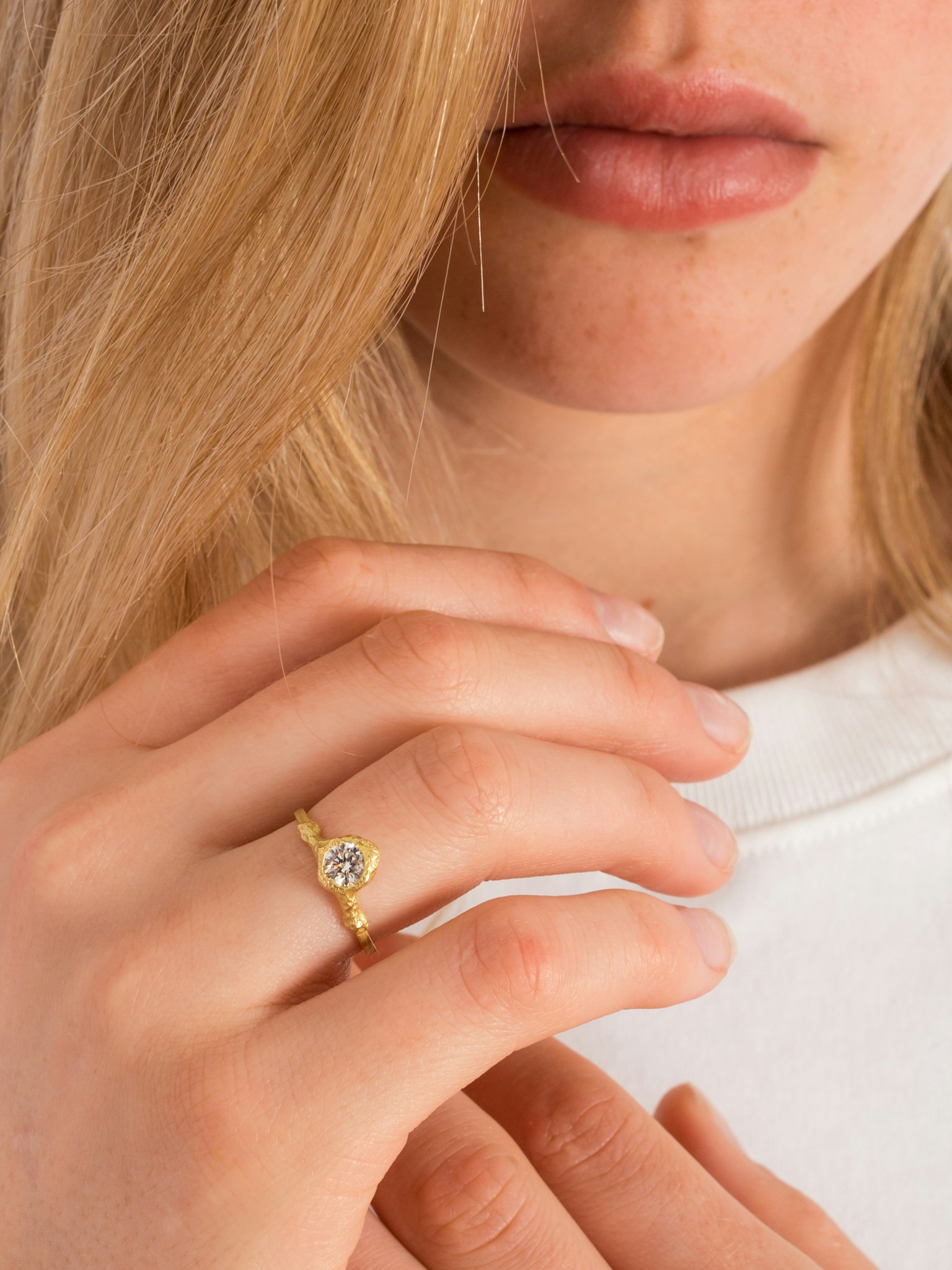 Solitaire iman 0.35ct diamond ring photo 2