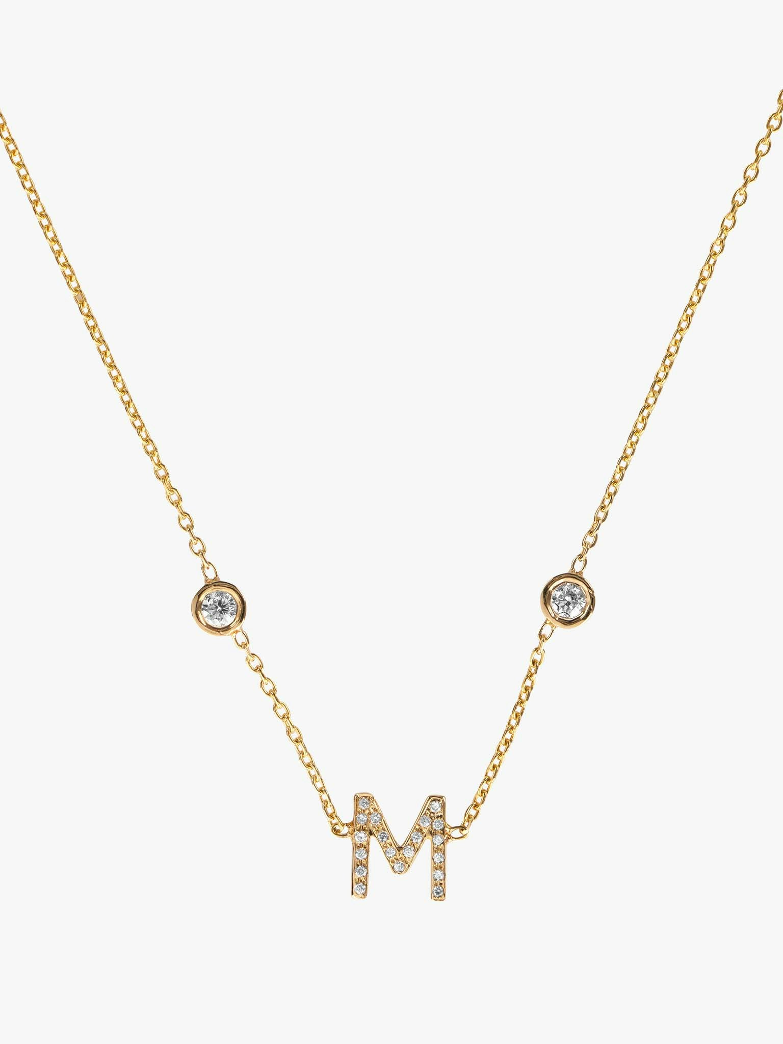 Mini pavé letter necklace with bezel diamonds photo 1