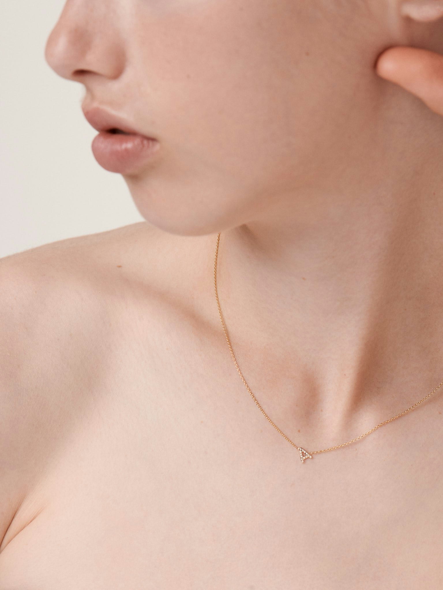 Mini pavé letter necklace photo 8