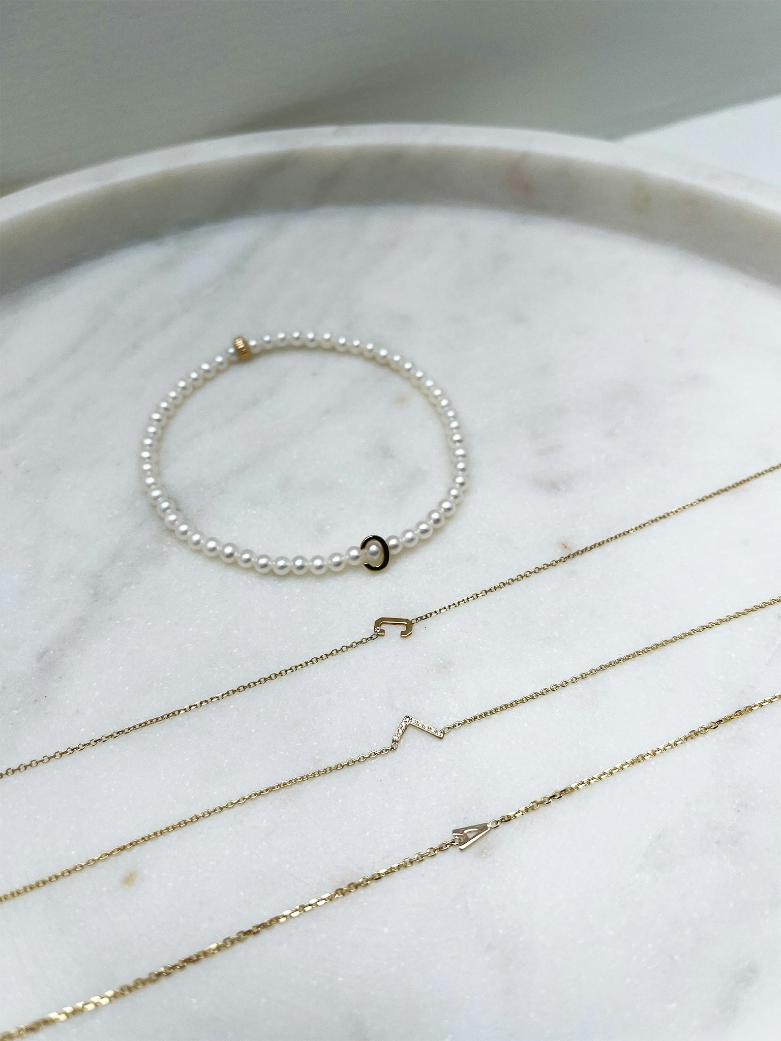 Mini letter necklace with diamond photo 5