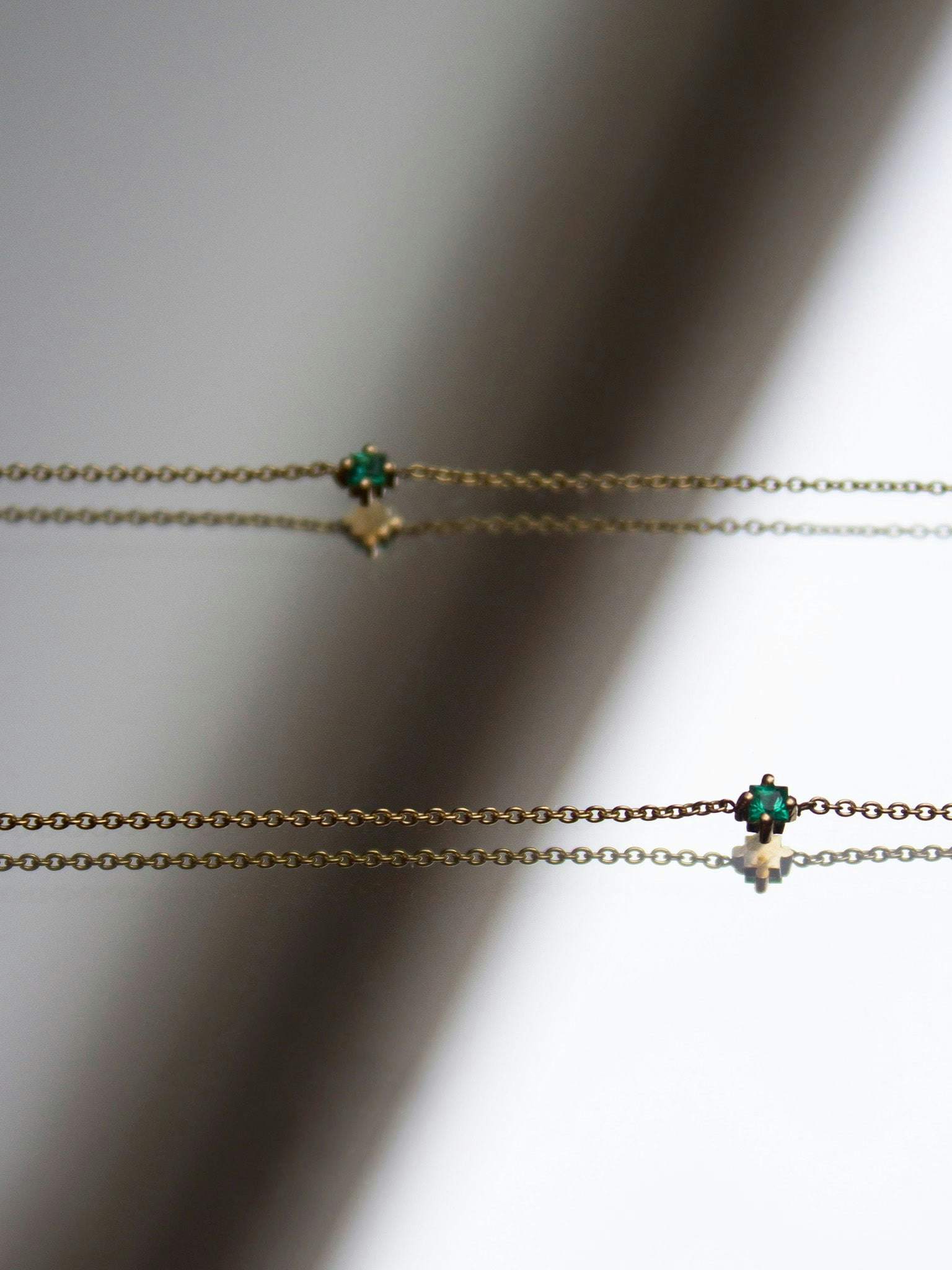 Princess cut emerald floating necklace photo 2