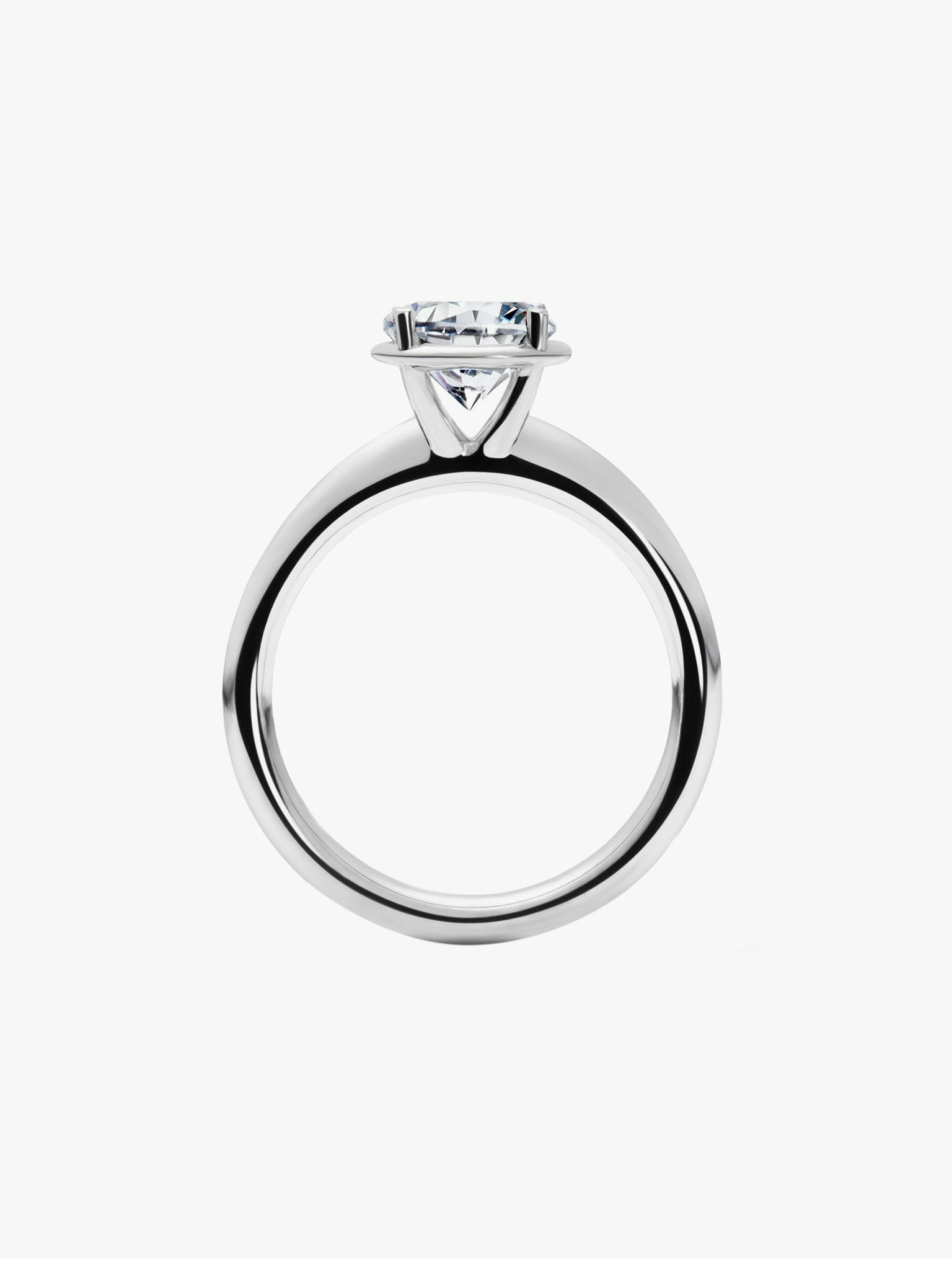 Solitaire 0.7ct diamond ring photo 1
