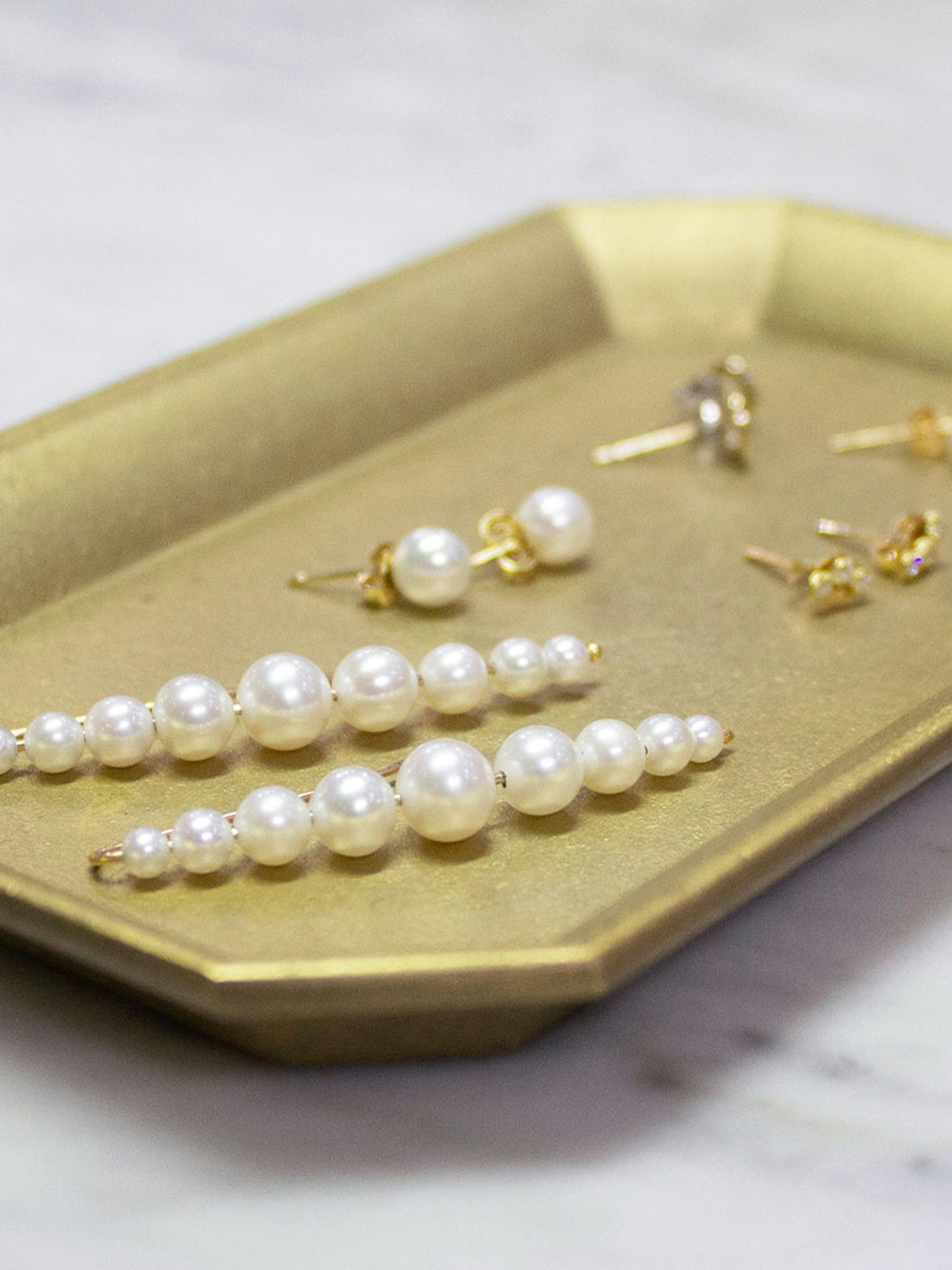 Cascading white pearl drop earrings photo 5